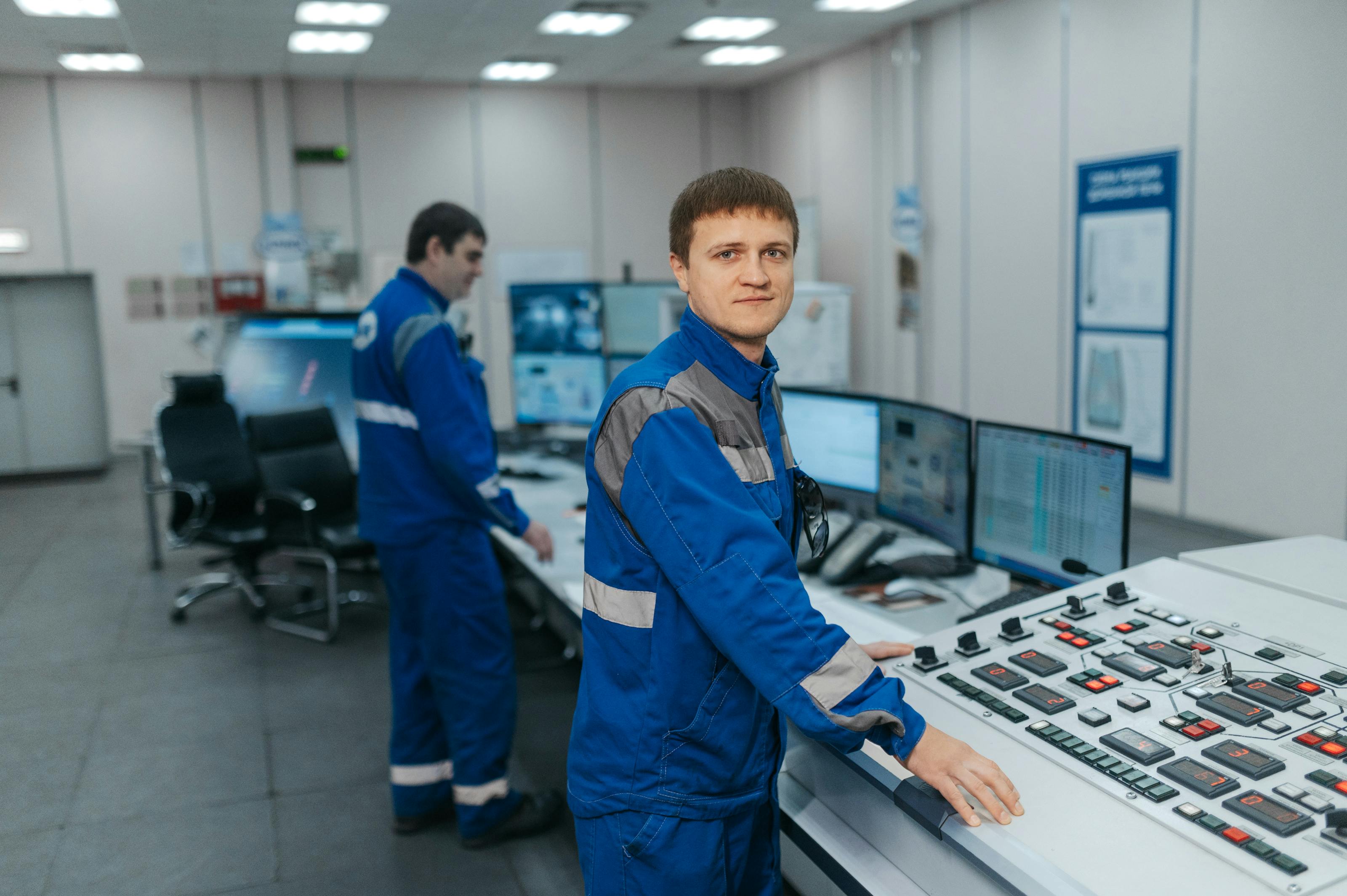 Laboratory instrumentation bench with a researcher operating diagnostic equipment.