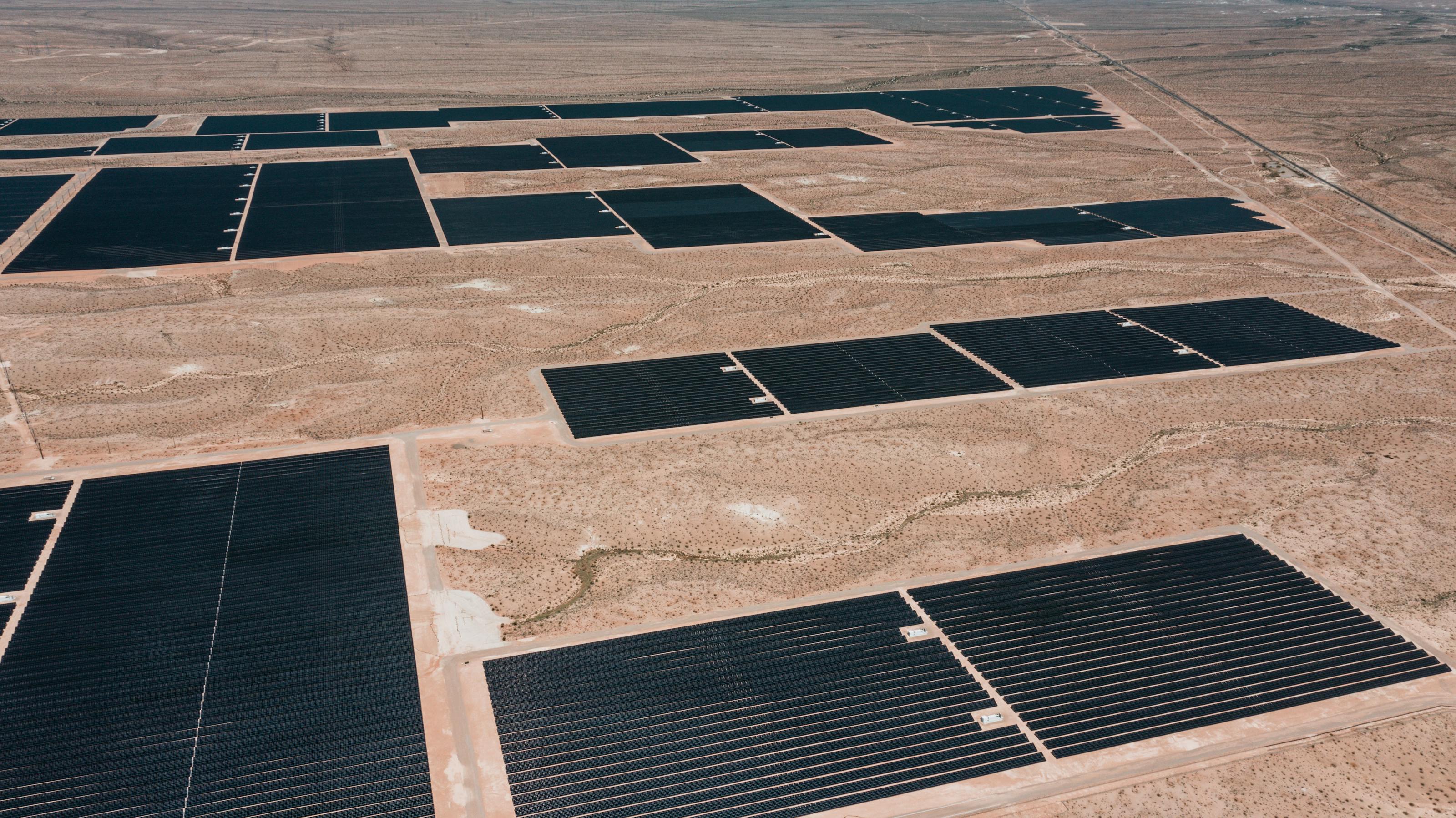 Wind turbines installed across agricultural land.