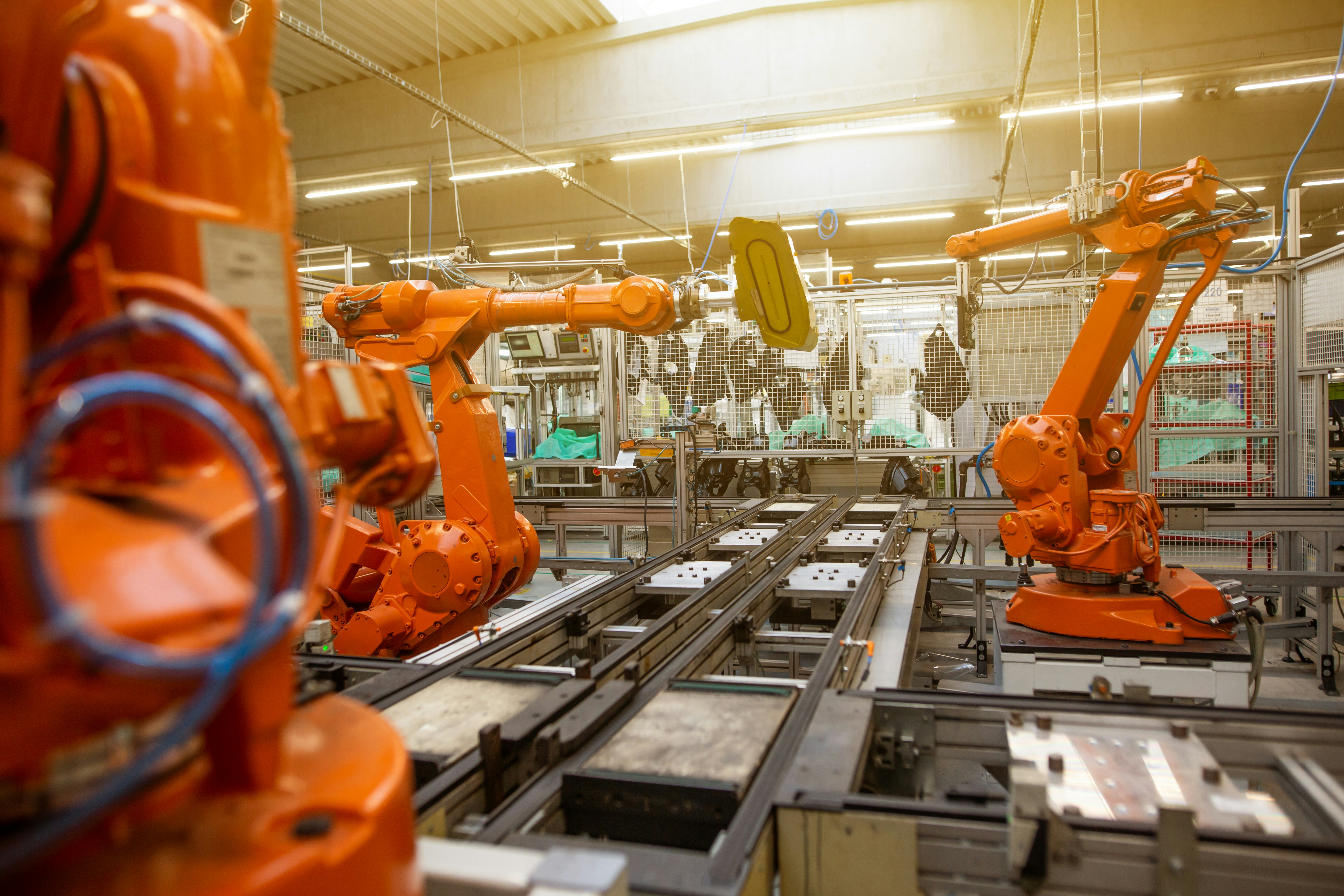 Factory team operating in an industrial pilot implementation setting.