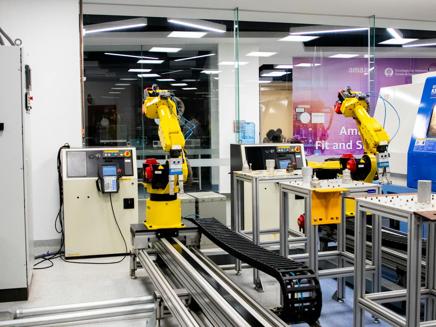 Robotic manufacturing cell in an automated production environment.
